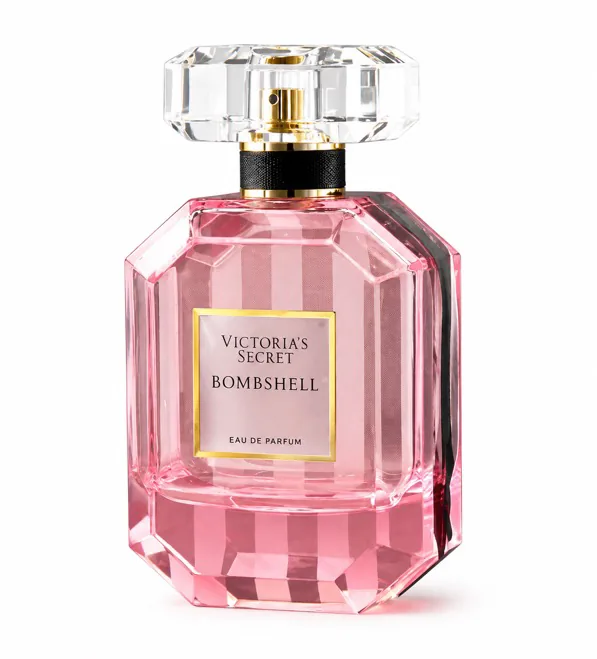 Injection molded fragrance packaging component with decorative finish